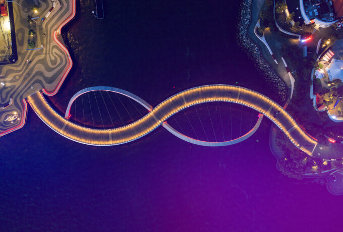 Overhead aerial view of the Elizabeth Quay pedestrian footbridge in Perth, Western Australia, used as a creative landmark in web design.