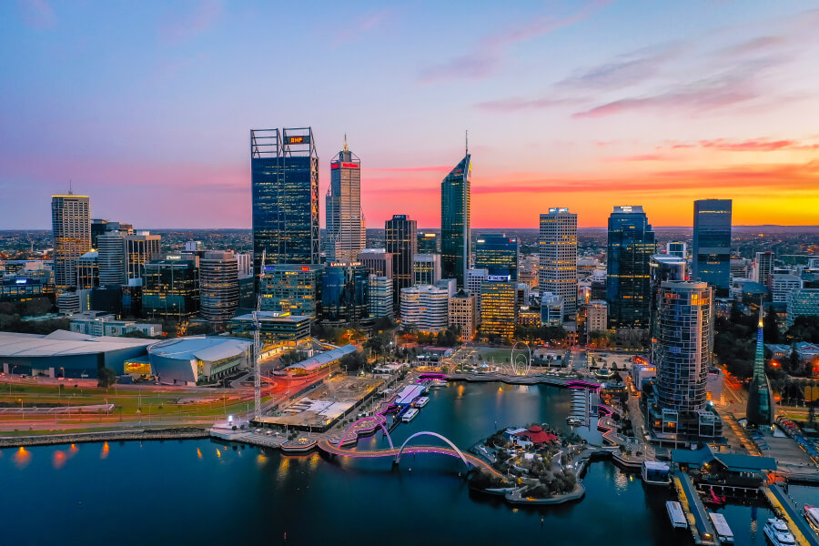 Perth city skyline at dawn with the Swan River in the foreground, showing how subtle local photography can enhance web design.