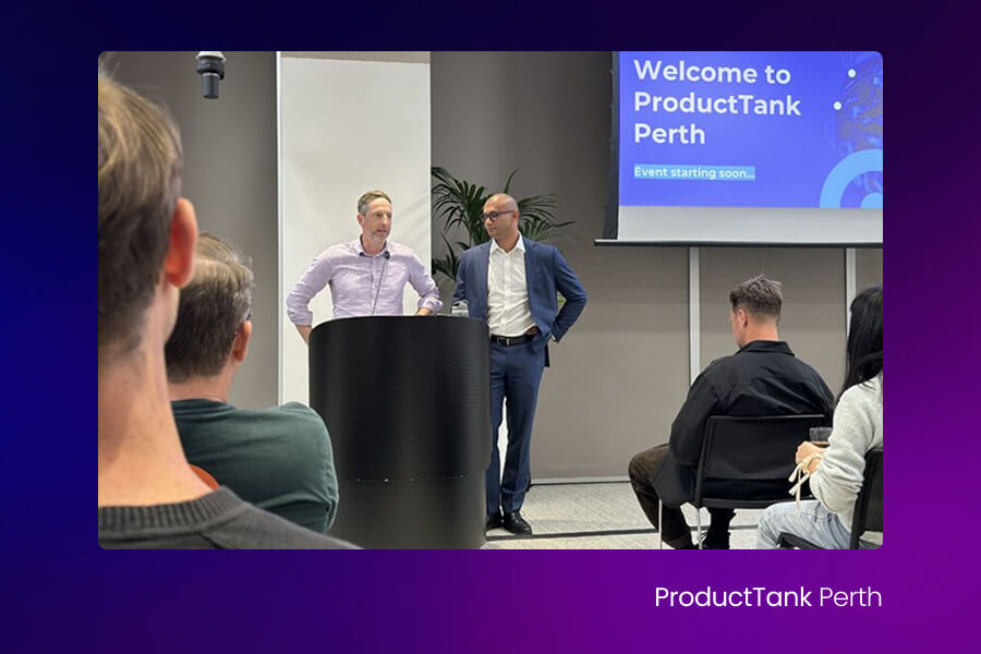 ProductTank Perth meetup with presenters speaking to an audience about product management and technology.