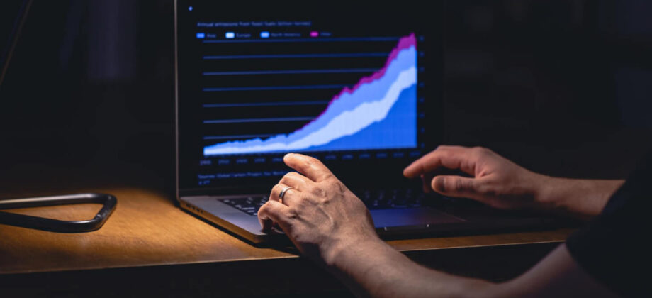Person analysing website performance metrics on a laptop, showing data-driven optimisation to improve speed and conversions.